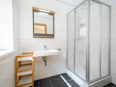 Ein Badezimmer in der Unterkunft Riesner Alm 35
