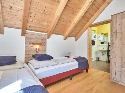 Ein Bett oder Betten in einem Zimmer der Unterkunft Mur-Chalet St Michael L
