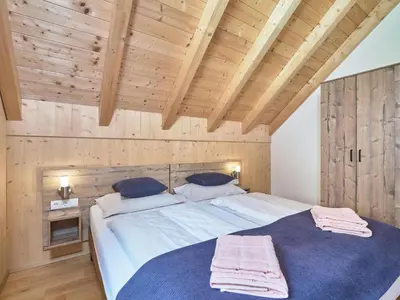 Ein Bett oder Betten in einem Zimmer der Unterkunft Mur-Chalet St Michael L