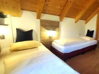 Ein Bett oder Betten in einem Zimmer der Unterkunft Mur-Chalet St Michael