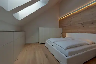Ein Bett oder Betten in einem Zimmer der Unterkunft Exclusive Alpenlodge ski in ski out Galsterberg