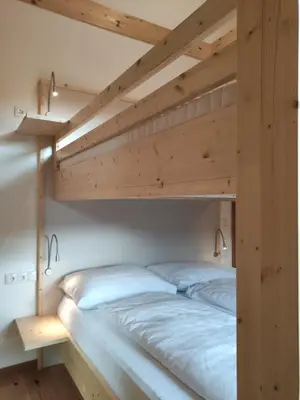 Ein Bett oder Betten in einem Zimmer der Unterkunft Haus Estelle