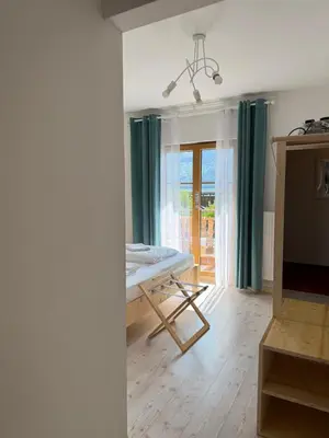 Ein Bett oder Betten in einem Zimmer der Unterkunft Seehotel am Hallstättersee