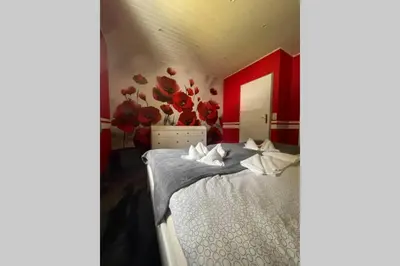 Ein Bett oder Betten in einem Zimmer der Unterkunft Murzeit Apartman