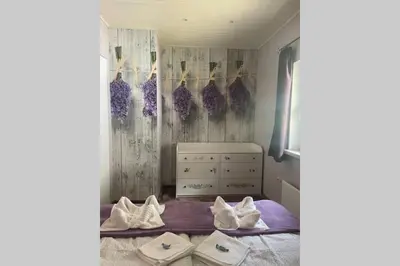 Ein Bett oder Betten in einem Zimmer der Unterkunft Murzeit Apartman