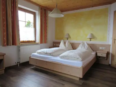 Ein Bett oder Betten in einem Zimmer der Unterkunft Steinerhaus Berggasthof
