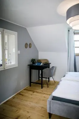 Ein Bett oder Betten in einem Zimmer der Unterkunft Apartment Aussee- Hallsatt Salzherrenhof- Küche, WLAN, Netflix