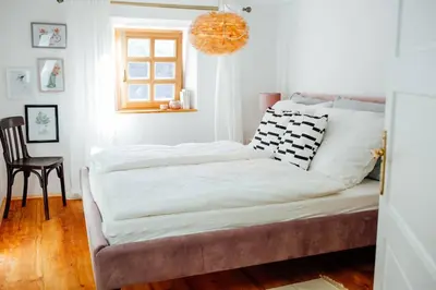 Ein Bett oder Betten in einem Zimmer der Unterkunft Apartment Aussee- Hallsatt Salzherrenhof- Küche, WLAN, Netflix
