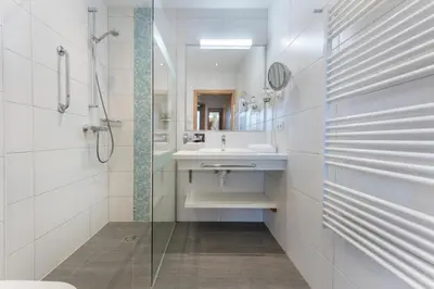 Ein Badezimmer in der Unterkunft Alpine Club Resort