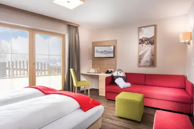 Ein Bett oder Betten in einem Zimmer der Unterkunft Der Burgfellnerhof - Adults Only