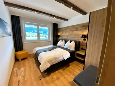 Ein Bett oder Betten in einem Zimmer der Unterkunft Arietem-Apartment - by myNests