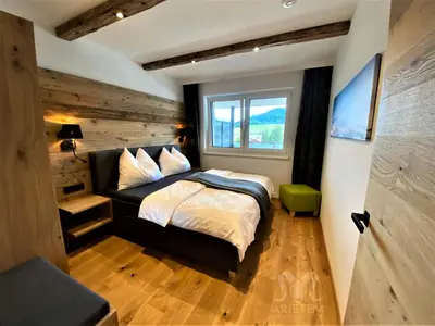 Ein Bett oder Betten in einem Zimmer der Unterkunft Arietem-Apartment - by myNests