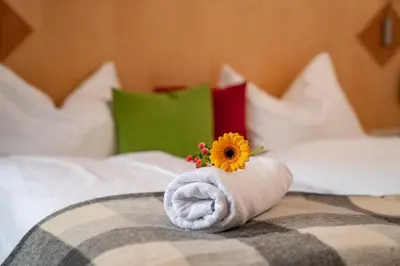 Ein Bett oder Betten in einem Zimmer der Unterkunft Hotel Gleimingerhof - Reiteralm
