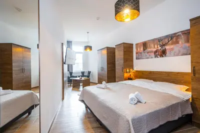 Ein Bett oder Betten in einem Zimmer der Unterkunft AlpenParks Hotel & Apartment Alpendorf