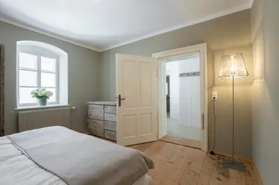 Ein Bett oder Betten in einem Zimmer der Unterkunft Braumeisterhaus Schloss Eggenberg
