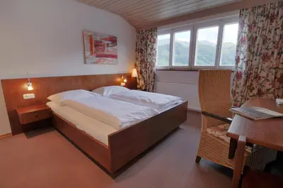 Ein Bett oder Betten in einem Zimmer der Unterkunft Landgasthof Kirchenwirt