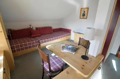 Ein Sitzbereich in der Unterkunft Landgasthof Kirchenwirt