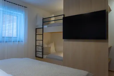 Ein Bett oder Betten in einem Zimmer der Unterkunft Bergzeit Gosau