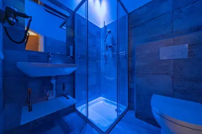 Ein Badezimmer in der Unterkunft Haus Weyregg - Pension