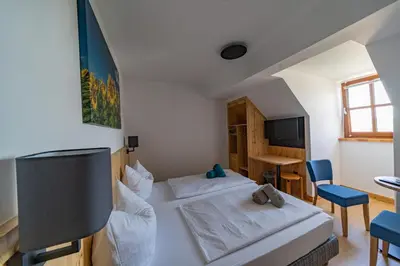 Ein Bett oder Betten in einem Zimmer der Unterkunft Haus Weyregg - Pension