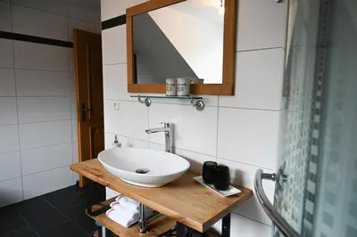 Ein Badezimmer in der Unterkunft Grubbauernhof