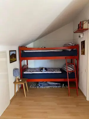 Ein Bett oder Betten in einem Zimmer der Unterkunft Haus Max