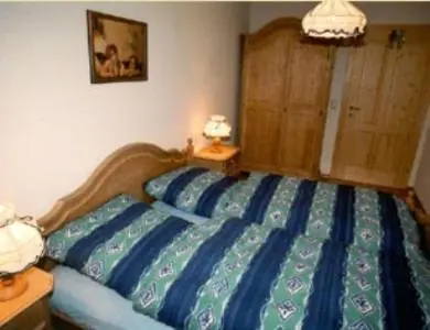 Ein Bett oder Betten in einem Zimmer der Unterkunft Ferienhaus Feuerer