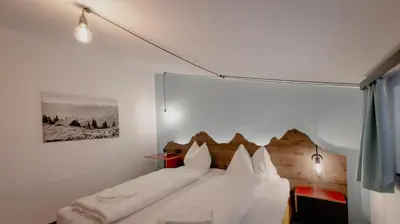 Ein Bett oder Betten in einem Zimmer der Unterkunft Bett & Berg Bad Ischl, Self Check-In