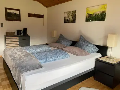 Ein Bett oder Betten in einem Zimmer der Unterkunft Egglmeiers Doppelzimmer