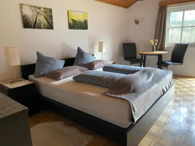Ein Bett oder Betten in einem Zimmer der Unterkunft Egglmeiers Doppelzimmer