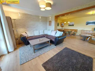 Ein Sitzbereich in der Unterkunft Apartment Alpenrock