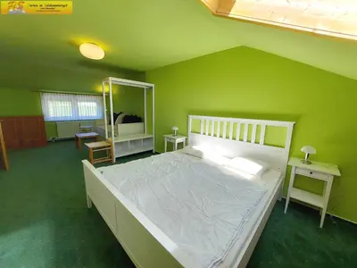 Ein Bett oder Betten in einem Zimmer der Unterkunft Apartment Alpenrock