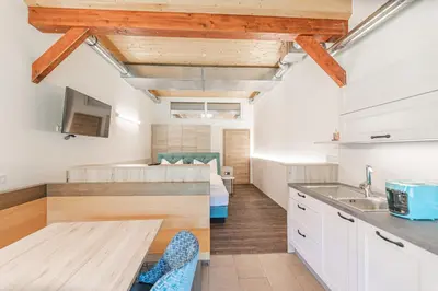 Küche/Küchenzeile in der Unterkunft Chalets am Badesee Lassing