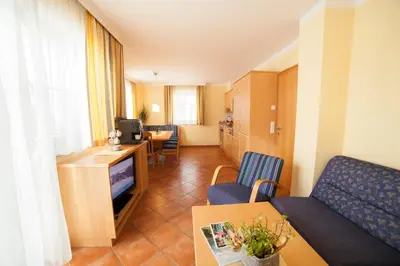 Ein Sitzbereich in der Unterkunft Appartements Höller
