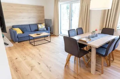Ein Sitzbereich in der Unterkunft Gleiming apartments
