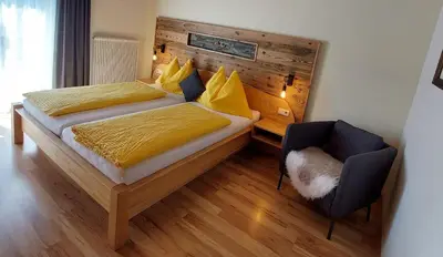 Ein Bett oder Betten in einem Zimmer der Unterkunft Appartements Zauchenseeblick Thunhart