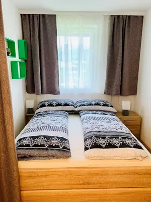 Ein Bett oder Betten in einem Zimmer der Unterkunft Buchenblick