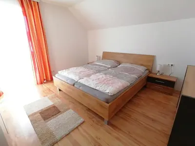 Ein Bett oder Betten in einem Zimmer der Unterkunft Apartment Bauer
