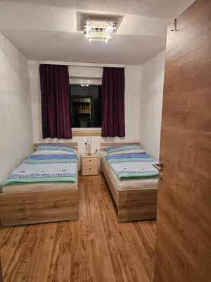 Ein Bett oder Betten in einem Zimmer der Unterkunft Apartment Bauer
