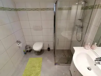 Ein Badezimmer in der Unterkunft Apartment Bauer