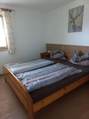 Ein Bett oder Betten in einem Zimmer der Unterkunft Premhof