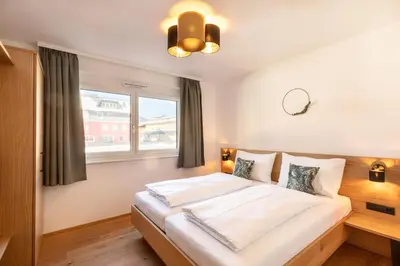 Ein Bett oder Betten in einem Zimmer der Unterkunft LISAL Appartements