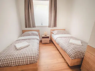 Ein Bett oder Betten in einem Zimmer der Unterkunft Alpenglueck Tauplitz