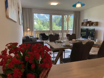 Ein Sitzbereich in der Unterkunft Grimmingblick Apartment 206 by AA Holiday Homes