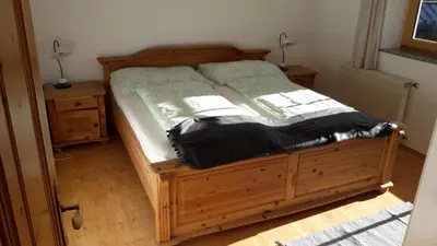 Ein Bett oder Betten in einem Zimmer der Unterkunft Ferienwohnung Appesbacher