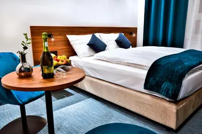 Ein Bett oder Betten in einem Zimmer der Unterkunft Hotel Das Zeit