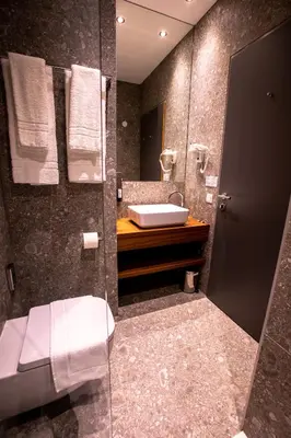 Ein Badezimmer in der Unterkunft Hotel Das Zeit