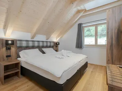 Ein Bett oder Betten in einem Zimmer der Unterkunft Vita Montagna