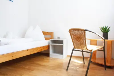 Ein Bett oder Betten in einem Zimmer der Unterkunft Royal 4 Trend by Alpenidyll Apartments