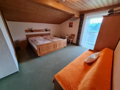 Ein Bett oder Betten in einem Zimmer der Unterkunft Apartement Obweghof Abtenau, Salzburger Land